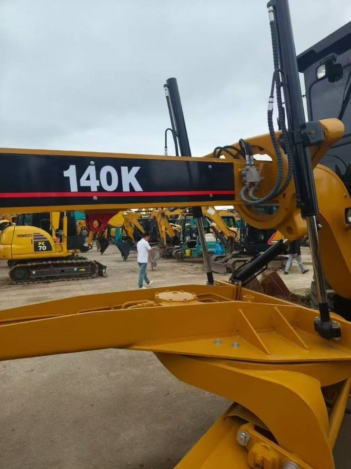 CAT 140K - Gréder: 5 kép. CAT 140K - Gréder: 5 kép.