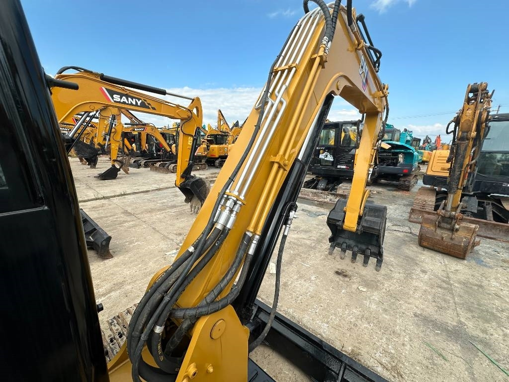 CAT 306E2 - Minikotró: 4 kép. CAT 306E2 - Minikotró: 4 kép.