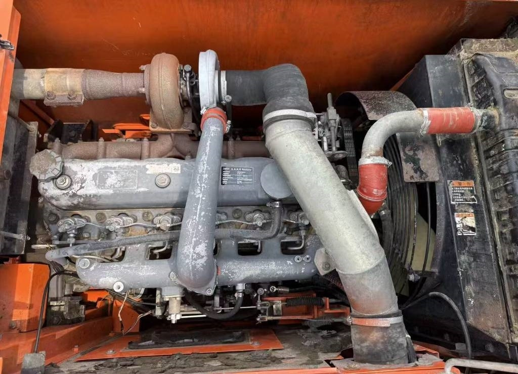 Doosan DH 150 W-7 - Gumikerekes kotró: 4 kép. Doosan DH 150 W-7 - Gumikerekes kotró: 4 kép.
