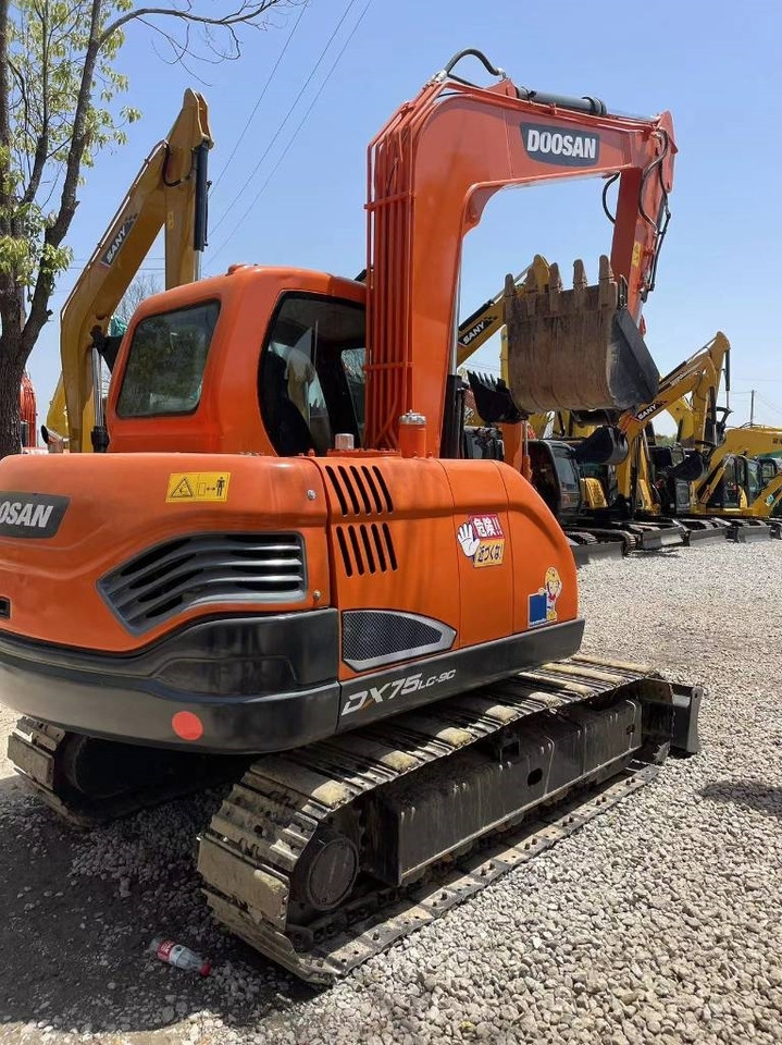 Doosan DX 75-9 C - Minikotró: 5 kép. Doosan DX 75-9 C - Minikotró: 5 kép.