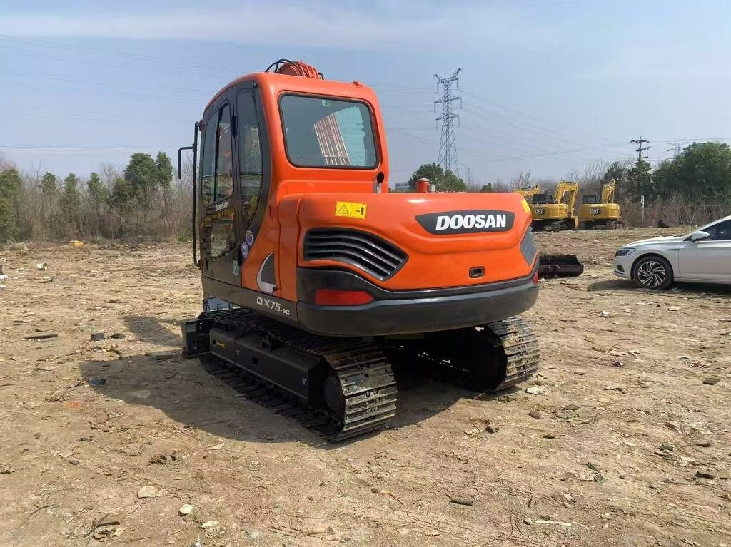 Doosan DX 75-9 C - Minikotró: 5 kép. Doosan DX 75-9 C - Minikotró: 5 kép.
