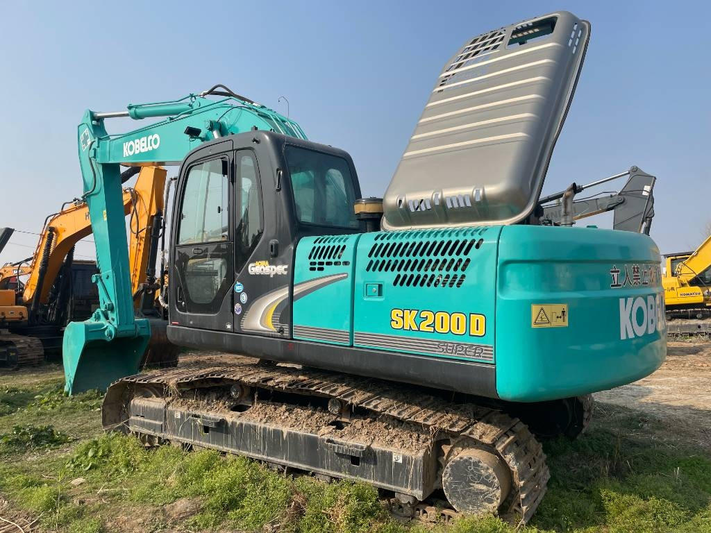Kobelco SK 200 - Lánctalpas kotró: 1 kép. Kobelco SK 200 - Lánctalpas kotró: 1 kép.