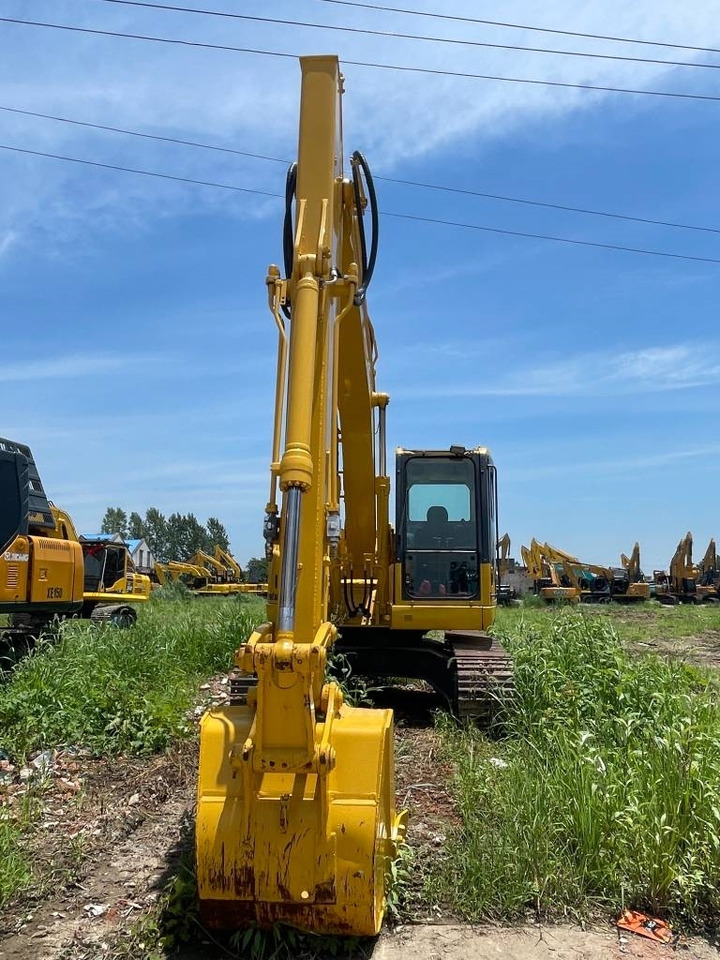 Komatsu PC 138 US - Lánctalpas kotró: 1 kép. Komatsu PC 138 US - Lánctalpas kotró: 1 kép.