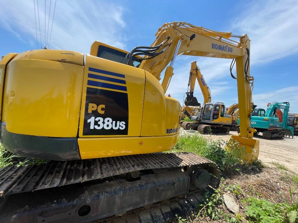 Komatsu PC 138 US - Lánctalpas kotró: 4 kép. Komatsu PC 138 US - Lánctalpas kotró: 4 kép.
