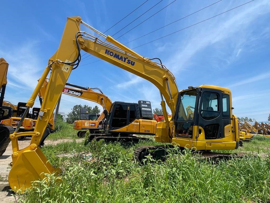 Komatsu PC 138 US - Lánctalpas kotró: 3 kép. Komatsu PC 138 US - Lánctalpas kotró: 3 kép.