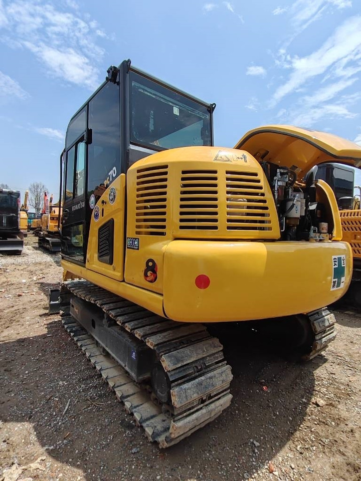 Komatsu PC 70 - Lánctalpas kotró: 2 kép. Komatsu PC 70 - Lánctalpas kotró: 2 kép.
