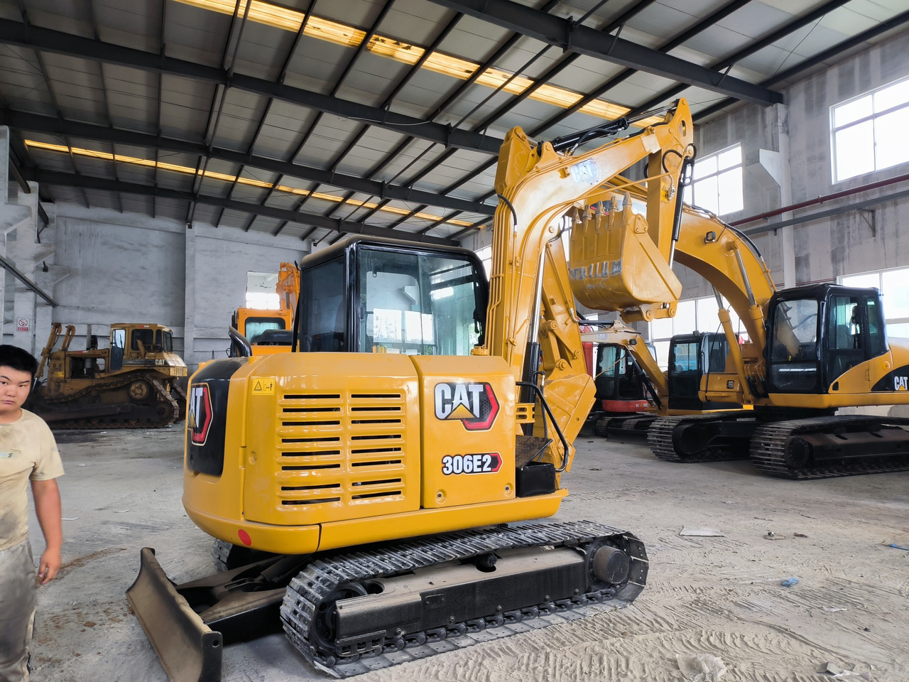 CATERPILLAR 306E - Minikotró: 1 kép. CATERPILLAR 306E - Minikotró: 1 kép.