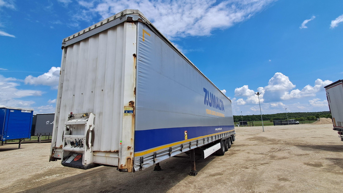 KRONE SD FIRANA - Ponyvás pótkocsi: 2 kép. KRONE SD FIRANA - Ponyvás pótkocsi: 2 kép.