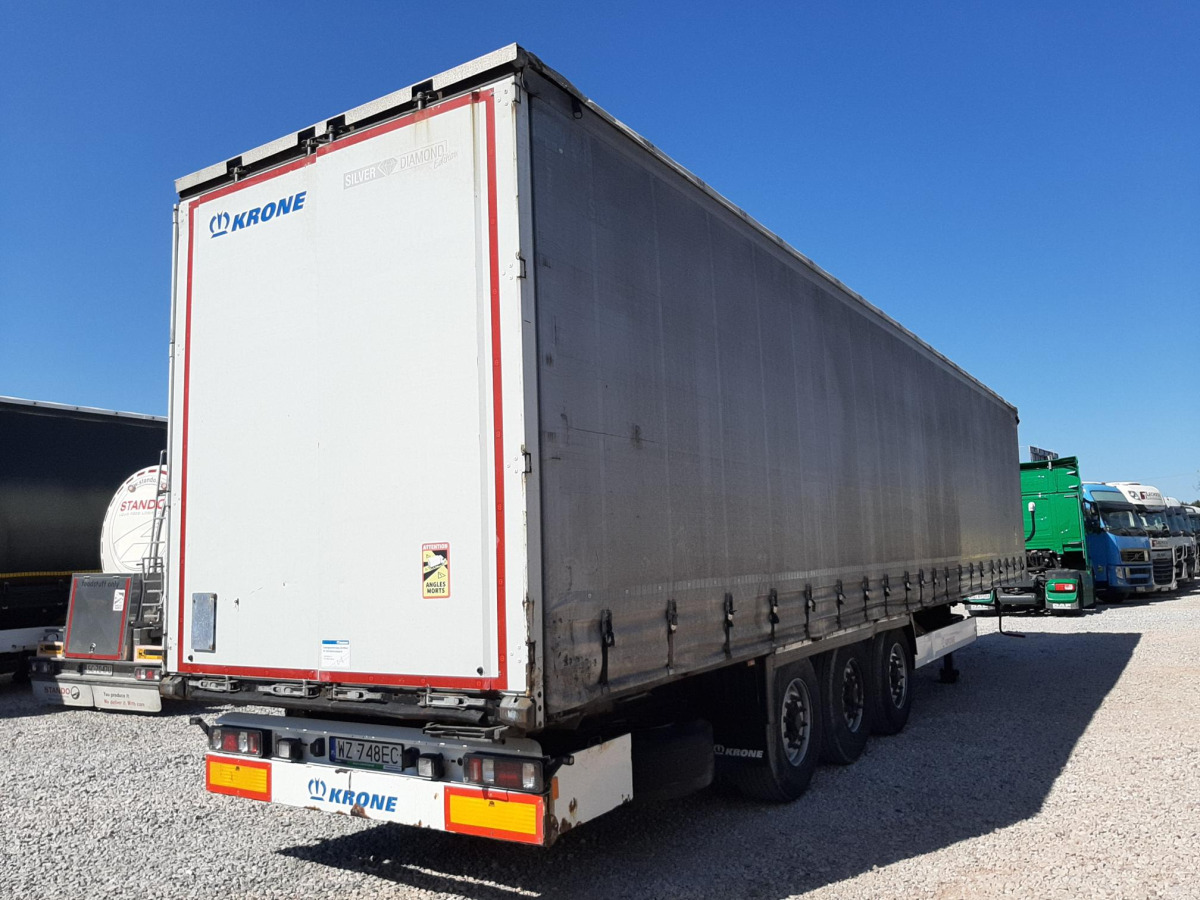 KRONE SD PLANDEKA/FIRANA - Ponyvás pótkocsi: 4 kép. KRONE SD PLANDEKA/FIRANA - Ponyvás pótkocsi: 4 kép.