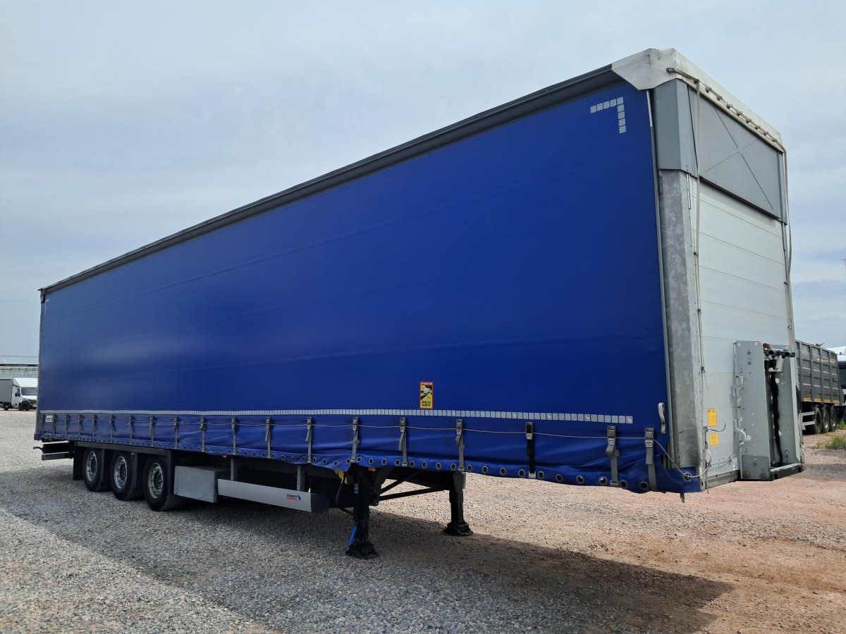 SCHMITZ CARGOBULL SCB S3T FIRANA - Ponyvás pótkocsi: 1 kép. SCHMITZ CARGOBULL SCB S3T FIRANA - Ponyvás pótkocsi: 1 kép.