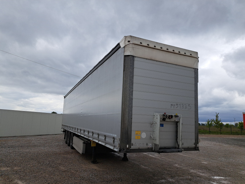 SCHMITZ CARGOBULL SCB S3T FIRANA - Ponyvás pótkocsi: 1 kép. SCHMITZ CARGOBULL SCB S3T FIRANA - Ponyvás pótkocsi: 1 kép.