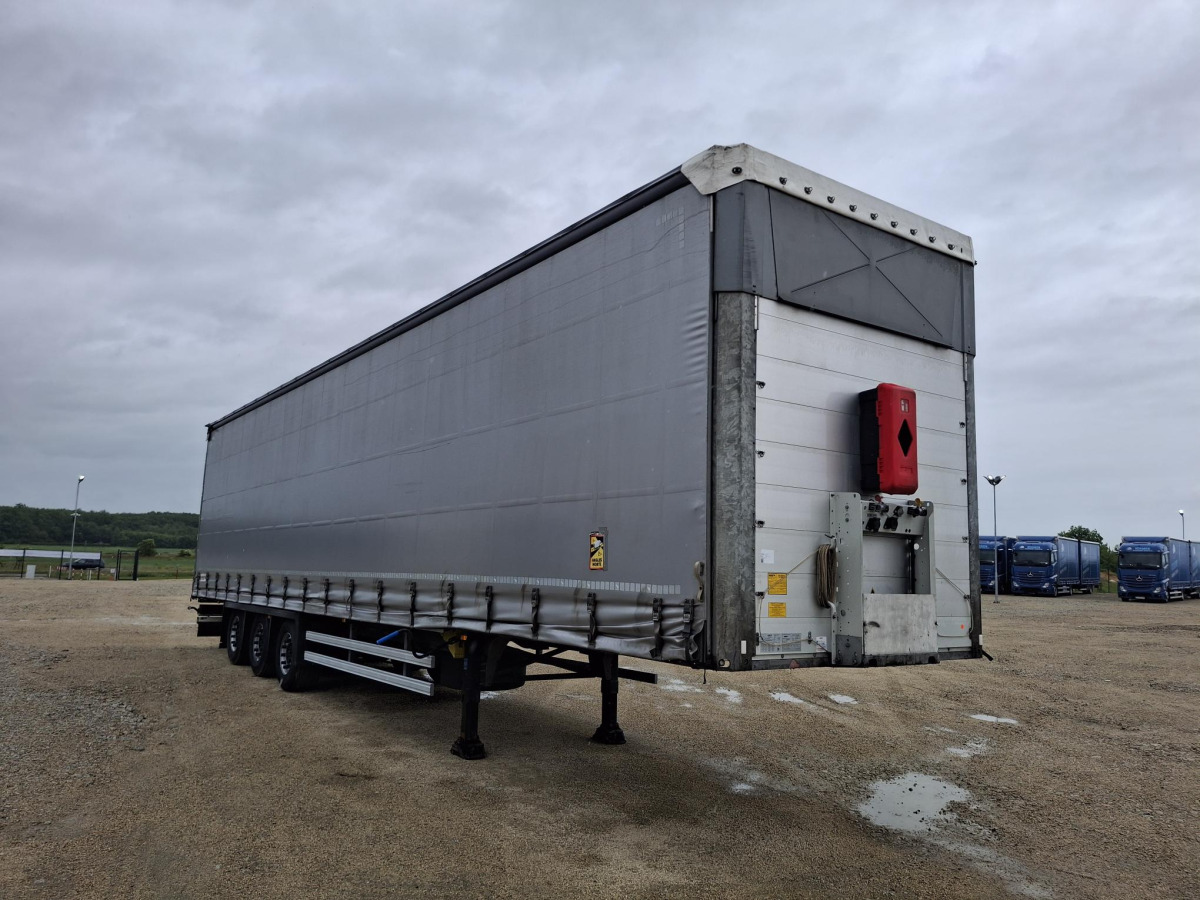 SCHMITZ CARGOBULL SCBS3T FIRANA - Ponyvás pótkocsi: 1 kép. SCHMITZ CARGOBULL SCBS3T FIRANA - Ponyvás pótkocsi: 1 kép.