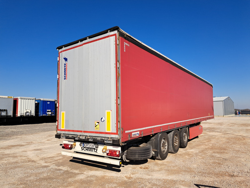 SCHMITZ CARGOBULL SCBS3T FIRANA - Ponyvás pótkocsi: 2 kép. SCHMITZ CARGOBULL SCBS3T FIRANA - Ponyvás pótkocsi: 2 kép.