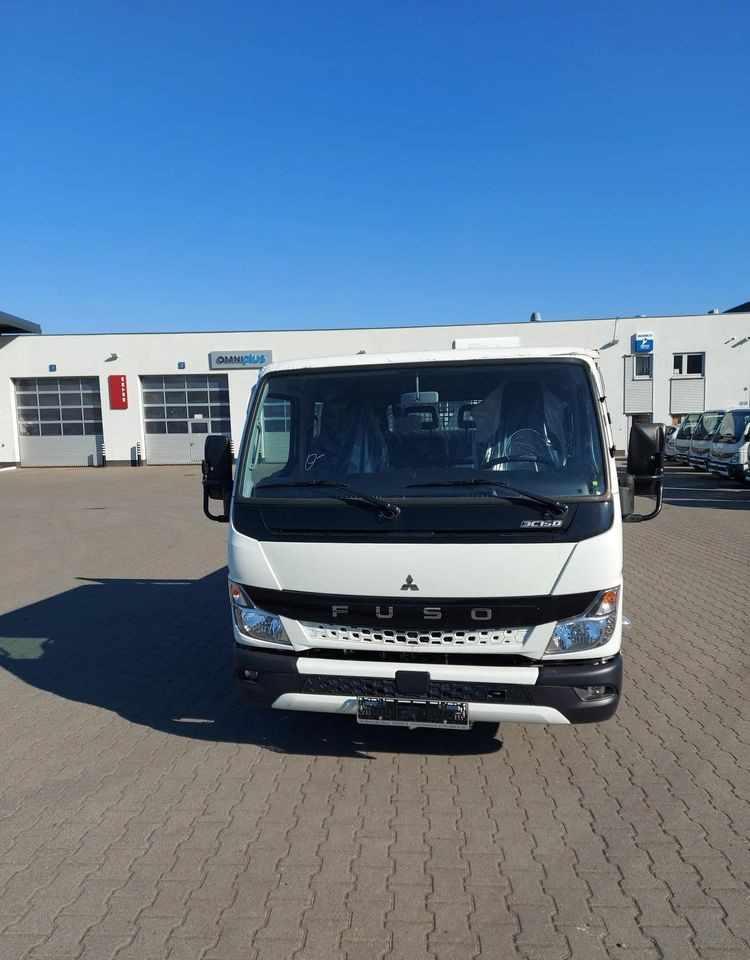 FUSO Canter 3C15D skrzynia - Szemetesautó: 2 kép. FUSO Canter 3C15D skrzynia - Szemetesautó: 2 kép.