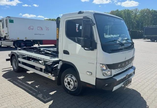 FUSO Canter 9C18 Hakowiec - Szemetesautó: 4 kép. FUSO Canter 9C18 Hakowiec - Szemetesautó: 4 kép.