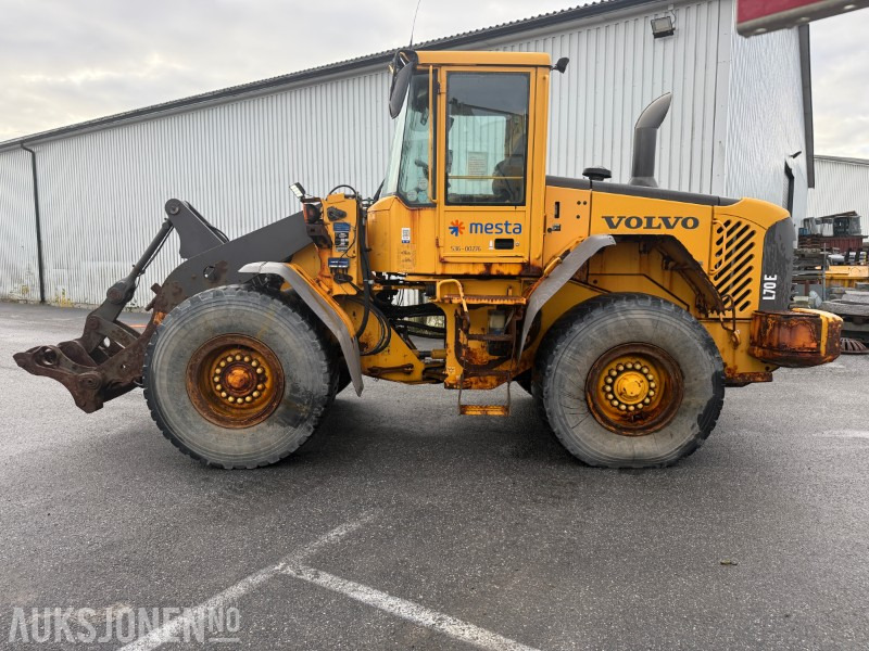 2006 Volvo L70E Hjullaster 3. og 4. funksjon. - Gumikerekes homlokrakodó: 4 kép. 2006 Volvo L70E Hjullaster 3. og 4. funksjon. - Gumikerekes homlokrakodó: 4 kép.