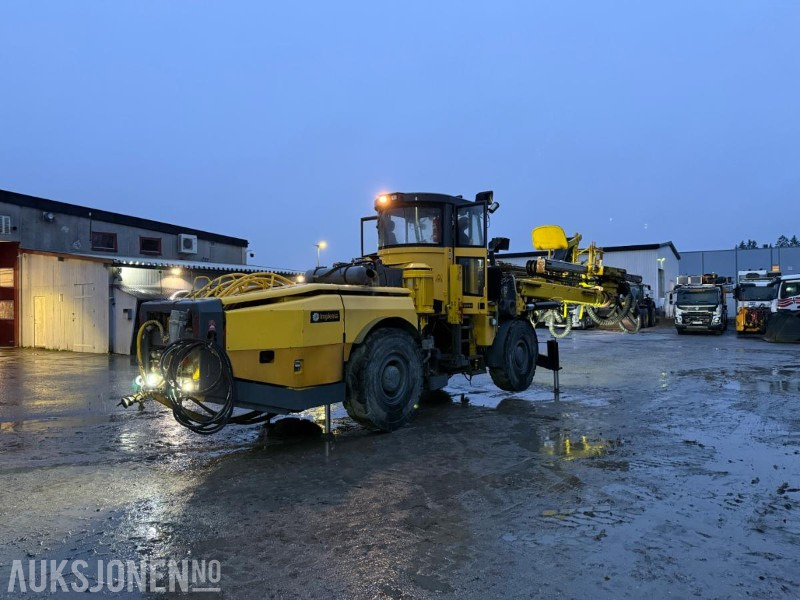 Fúrógép 2012 Atlas Copco Boomer E2C Borerigg, To-bom oppsett med integrert kurv: 6 kép.