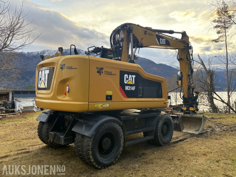 2016 Cat M314F hjulgraver - serviceavtale - nylig service - tiltrotator og pusseskuffe - Gumikerekes kotró: 3 kép. 2016 Cat M314F hjulgraver - serviceavtale - nylig service - tiltrotator og pusseskuffe - Gumikerekes kotró: 3 kép.