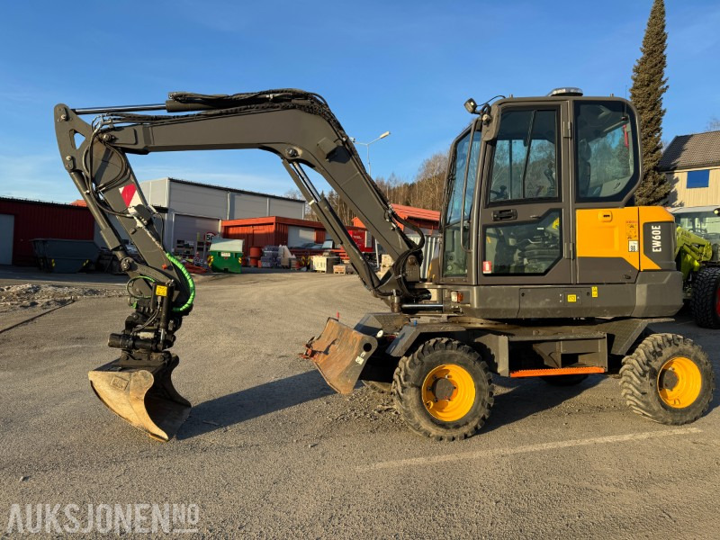 2020 Volvo EW60E HJULGRAVER MED TOLTROTATOR OG 2 SKUFFER - Kotrógép: 1 kép. 2020 Volvo EW60E HJULGRAVER MED TOLTROTATOR OG 2 SKUFFER - Kotrógép: 1 kép.