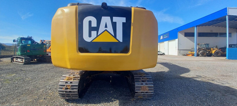 Caterpillar 323ELN - Lánctalpas kotró: 3 kép. Caterpillar 323ELN - Lánctalpas kotró: 3 kép.