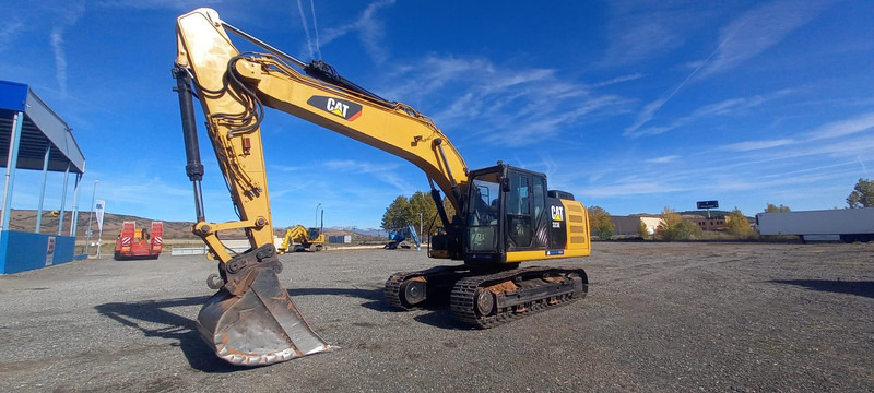 Caterpillar 323ELN - Lánctalpas kotró: 4 kép. Caterpillar 323ELN - Lánctalpas kotró: 4 kép.