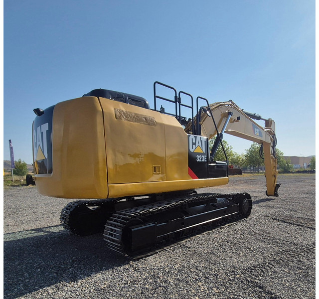 Caterpillar 323ELN - Lánctalpas kotró: 3 kép. Caterpillar 323ELN - Lánctalpas kotró: 3 kép.
