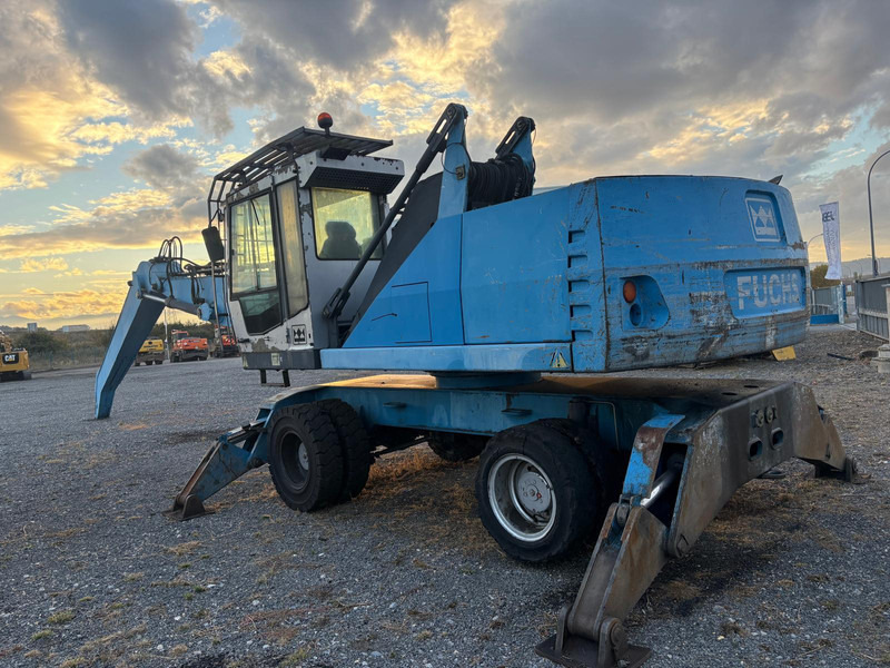 Fuchs MHL340 - Gumikerekes kotró: 4 kép. Fuchs MHL340 - Gumikerekes kotró: 4 kép.