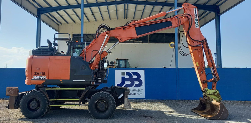 Hitachi ZX145W-6 **2 units** - Gumikerekes kotró: 2 kép. Hitachi ZX145W-6 **2 units** - Gumikerekes kotró: 2 kép.