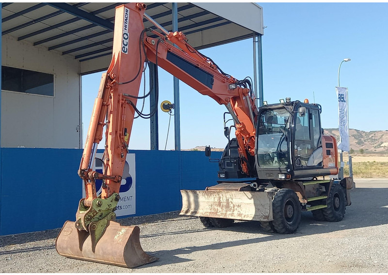 Hitachi ZX145W-6 **2 units** - Gumikerekes kotró: 5 kép. Hitachi ZX145W-6 **2 units** - Gumikerekes kotró: 5 kép.