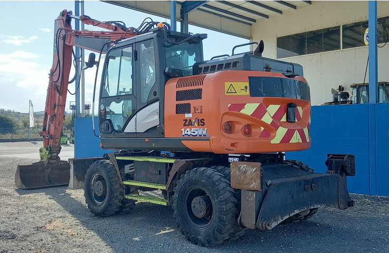 Hitachi ZX145W-6 **2 units** - Gumikerekes kotró: 3 kép. Hitachi ZX145W-6 **2 units** - Gumikerekes kotró: 3 kép.