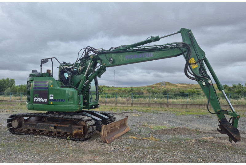 Komatsu PC138US-11 - Lánctalpas kotró: 2 kép. Komatsu PC138US-11 - Lánctalpas kotró: 2 kép.