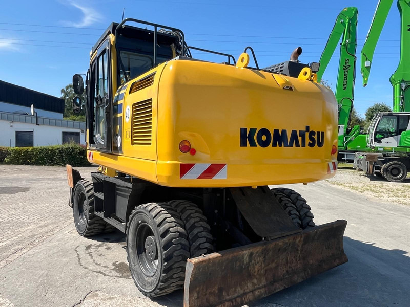 Komatsu PW180-10 - Gumikerekes kotró: 2 kép. Komatsu PW180-10 - Gumikerekes kotró: 2 kép.