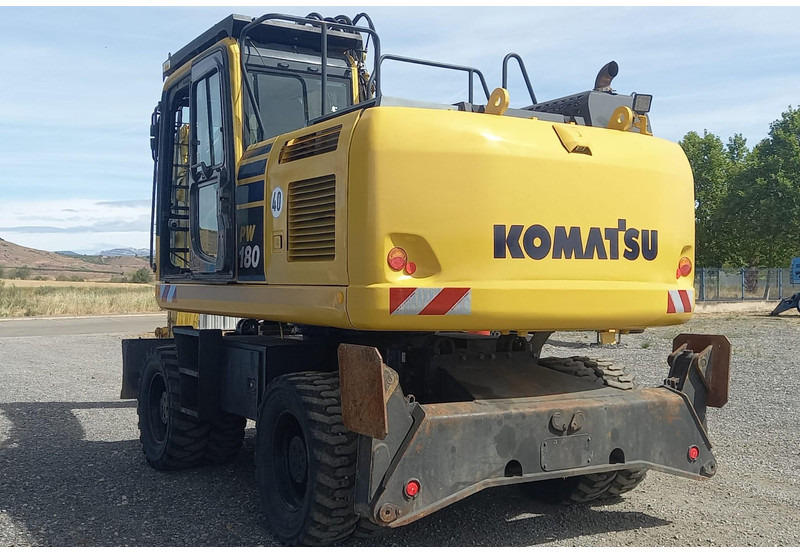 Komatsu PW180-10 - Gumikerekes kotró: 4 kép. Komatsu PW180-10 - Gumikerekes kotró: 4 kép.