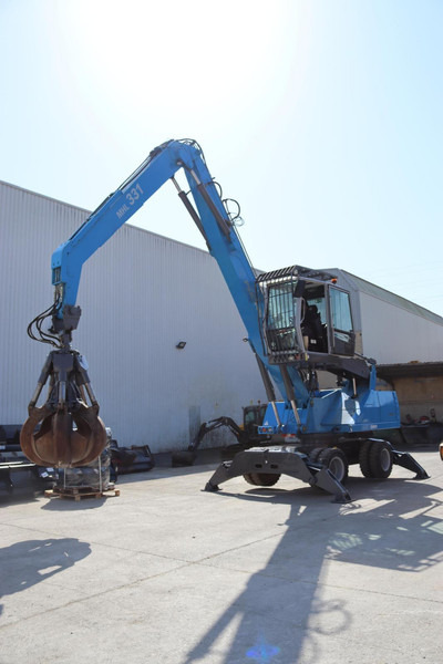 Terex Fuchs MHL331 - Gumikerekes kotró: 1 kép. Terex Fuchs MHL331 - Gumikerekes kotró: 1 kép.