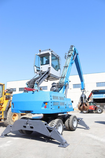 Terex Fuchs MHL331 - Gumikerekes kotró: 3 kép. Terex Fuchs MHL331 - Gumikerekes kotró: 3 kép.