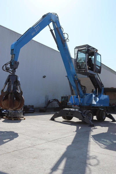 Gumikerekes kotró Terex Fuchs MHL331: 6 kép.