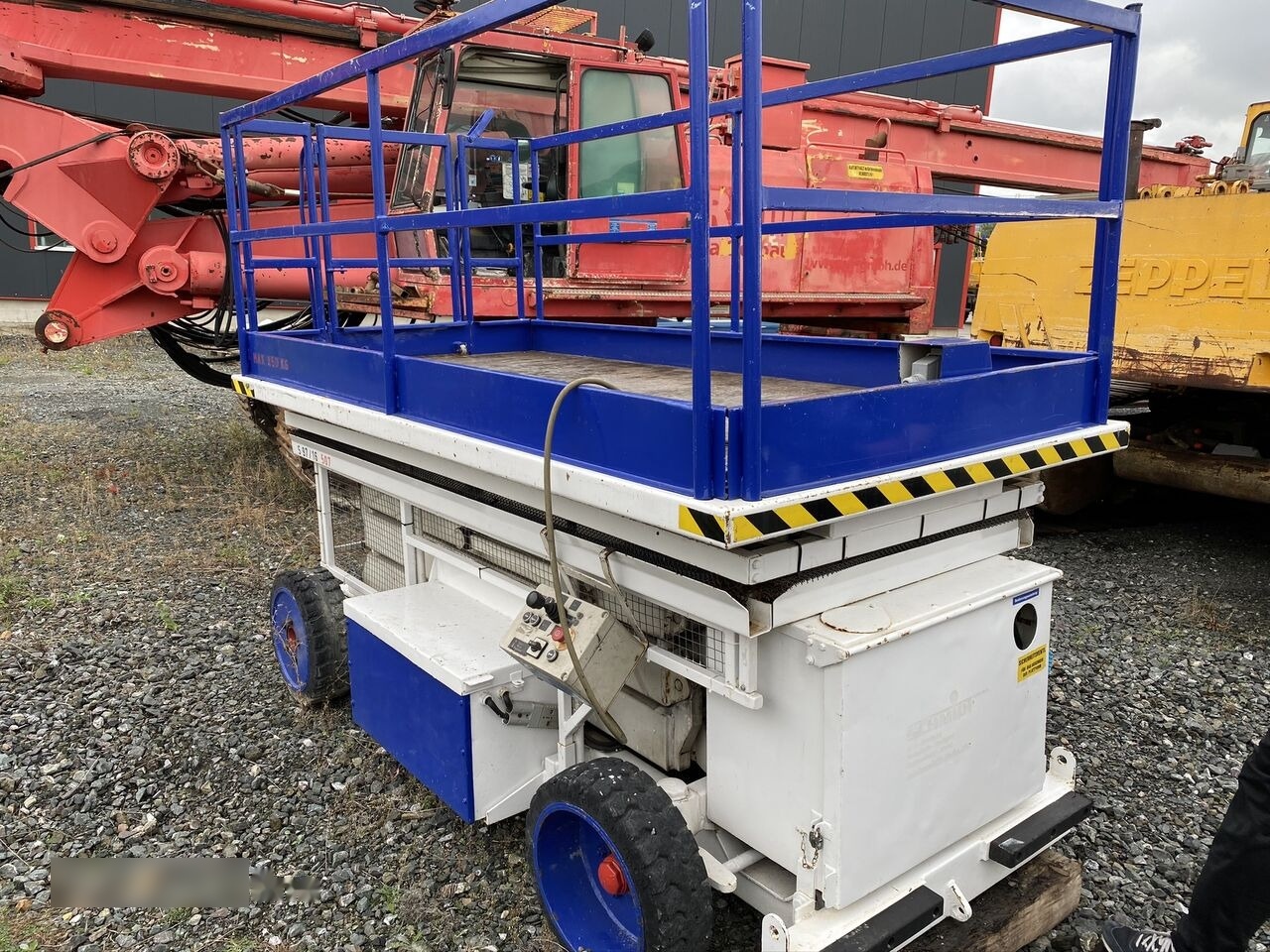 Bluelift NACELA LIFT TKD HL 80 EV / Electrica / 9,7 m / 850 kg - Ollós emelő: 1 kép. Bluelift NACELA LIFT TKD HL 80 EV / Electrica / 9,7 m / 850 kg - Ollós emelő: 1 kép.