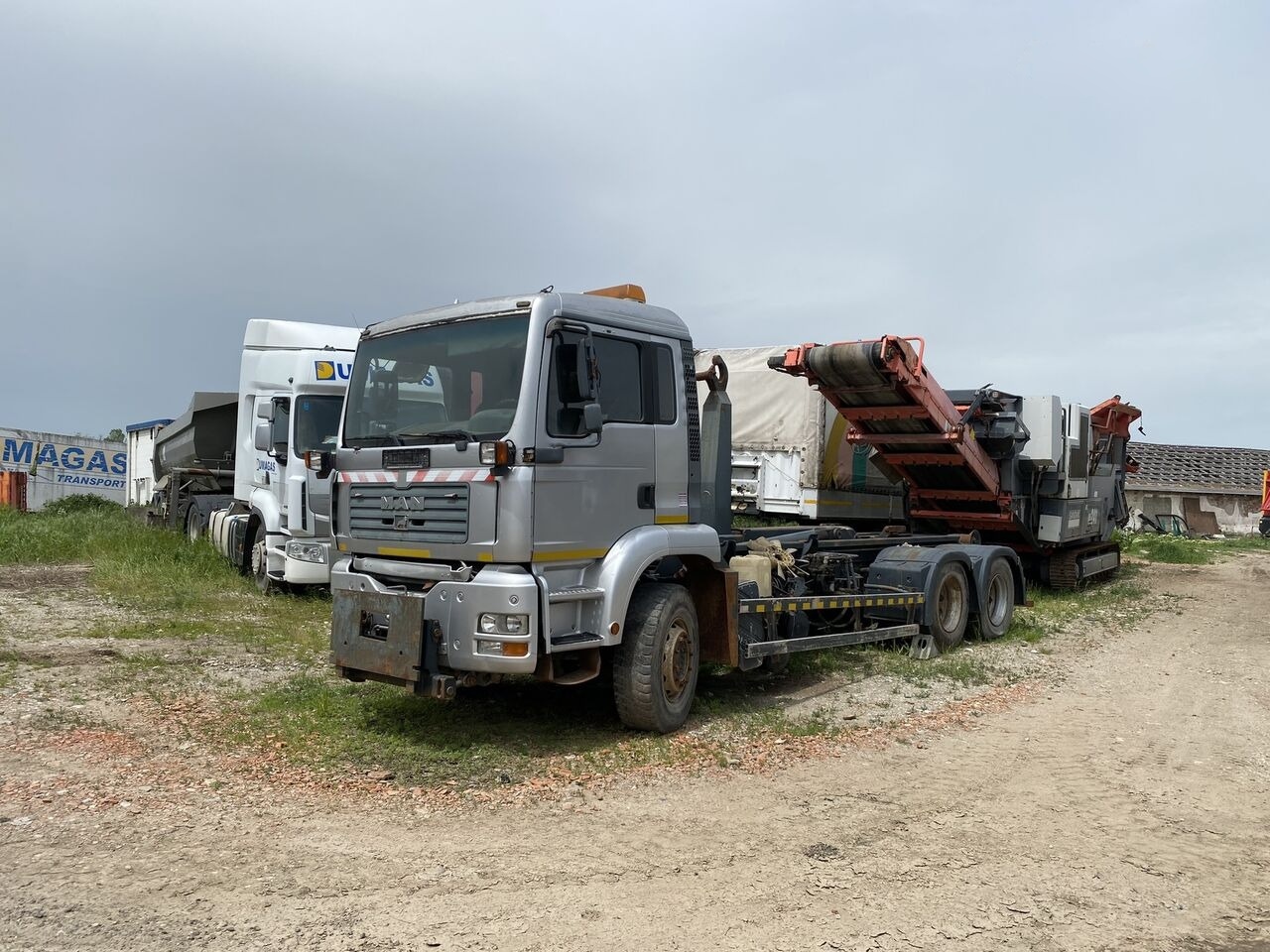 MAN TGA 6x4 Euro 3 AbrollKipper - Alvaz teherautó: 2 kép. MAN TGA 6x4 Euro 3 AbrollKipper - Alvaz teherautó: 2 kép.