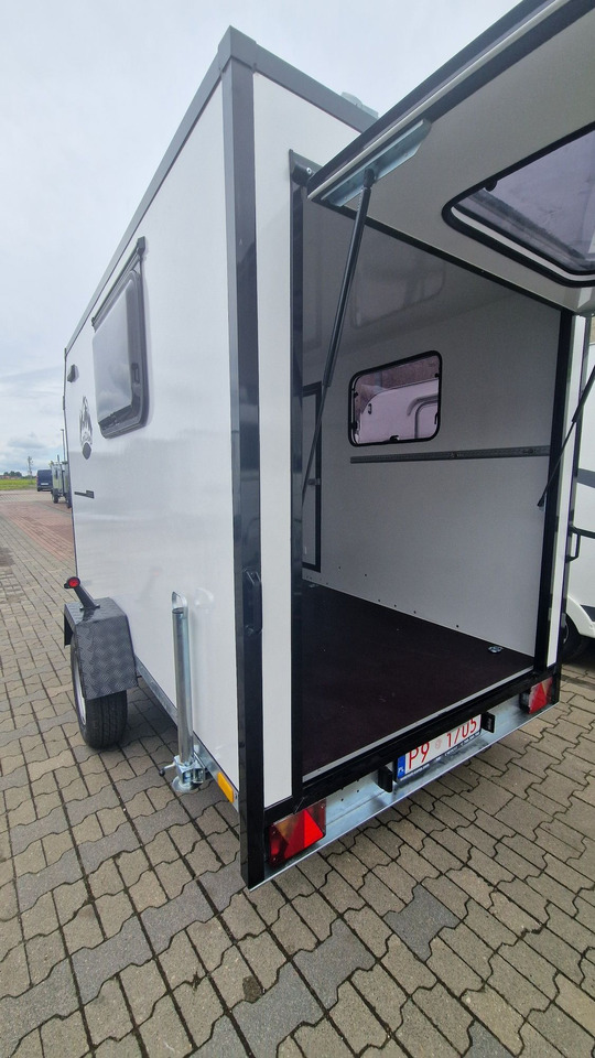 Everest MiniCamp przyczepa kempingowa Ciężarowa towarowa - Lakókocsi: 2 kép. Everest MiniCamp przyczepa kempingowa Ciężarowa towarowa - Lakókocsi: 2 kép.