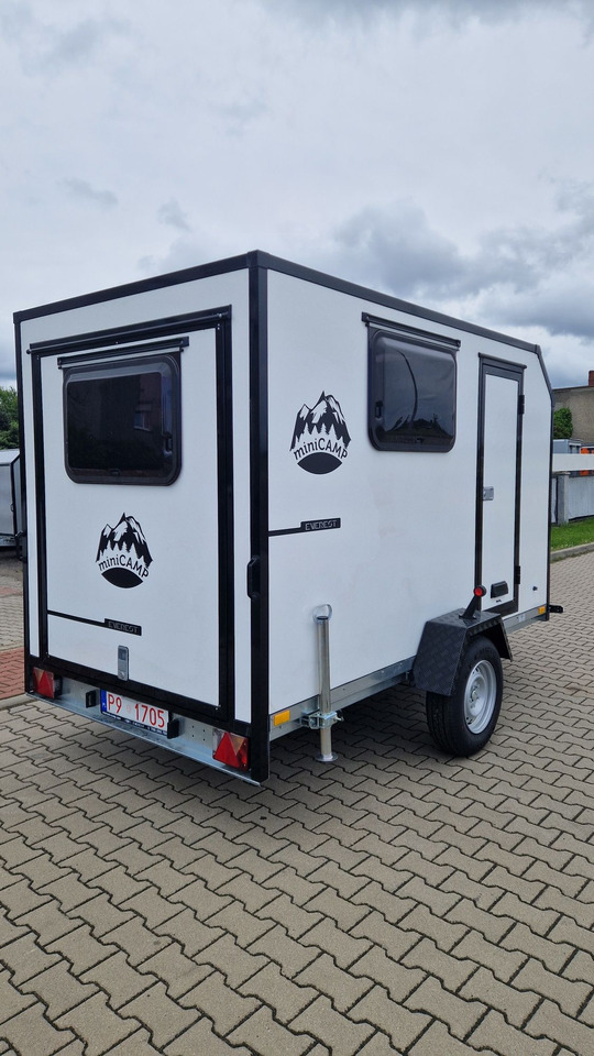 Everest MiniCamp przyczepa kempingowa Ciężarowa towarowa - Lakókocsi: 1 kép. Everest MiniCamp przyczepa kempingowa Ciężarowa towarowa - Lakókocsi: 1 kép.