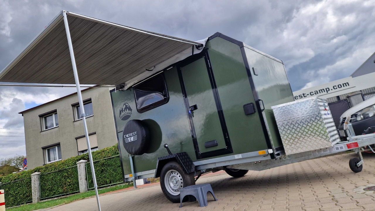 Everest Minicamp Kempinowa Towarowa Przyczepa lekka - Lakókocsi: 4 kép. Everest Minicamp Kempinowa Towarowa Przyczepa lekka - Lakókocsi: 4 kép.