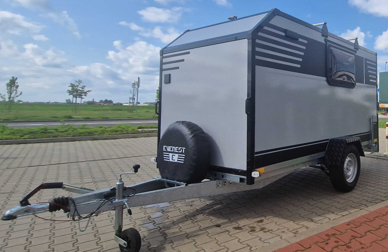 Everest Minicamp Kempinowa Towarowa Przyczepa lekka - Lakókocsi: 3 kép. Everest Minicamp Kempinowa Towarowa Przyczepa lekka - Lakókocsi: 3 kép.