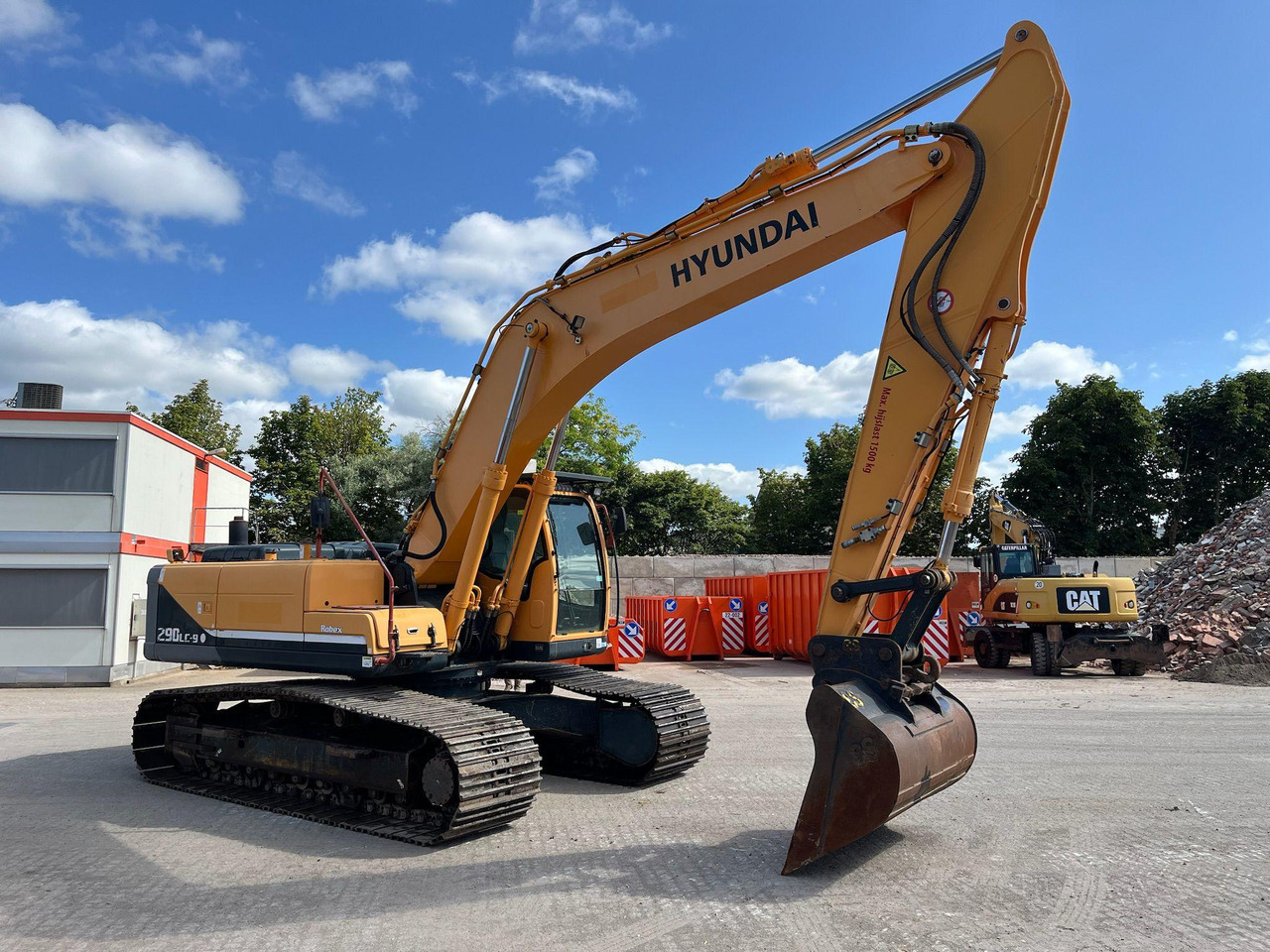 Hyundai Robex 290-9 - Lánctalpas kotró: 5 kép. Hyundai Robex 290-9 - Lánctalpas kotró: 5 kép.