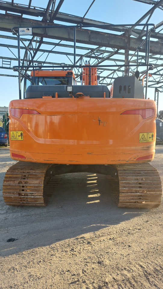 DOOSAN DX140LC-5 - Lánctalpas kotró: 4 kép. DOOSAN DX140LC-5 - Lánctalpas kotró: 4 kép.