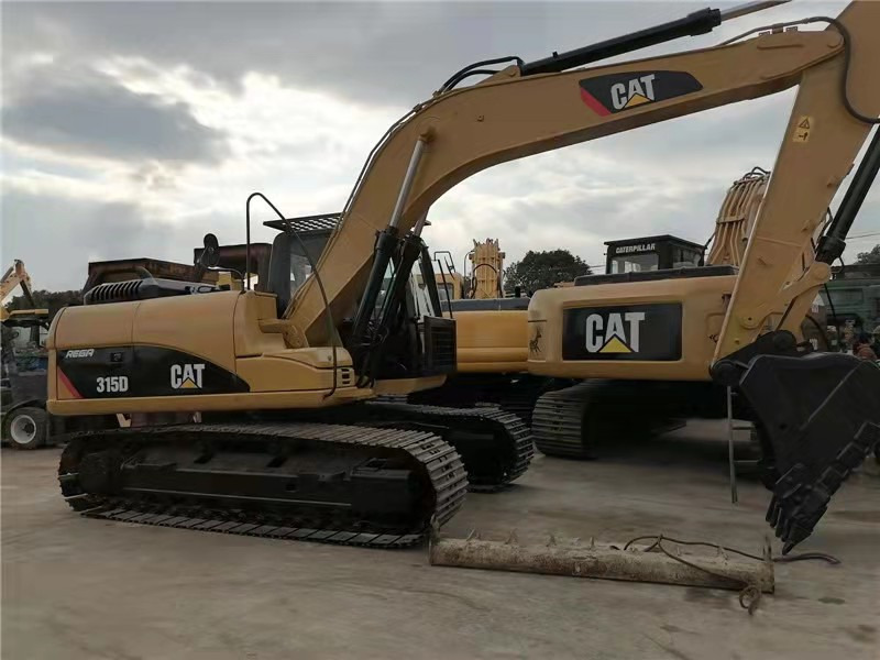 CAT 315D excavator - Lánctalpas kotró: 1 kép. CAT 315D excavator - Lánctalpas kotró: 1 kép.