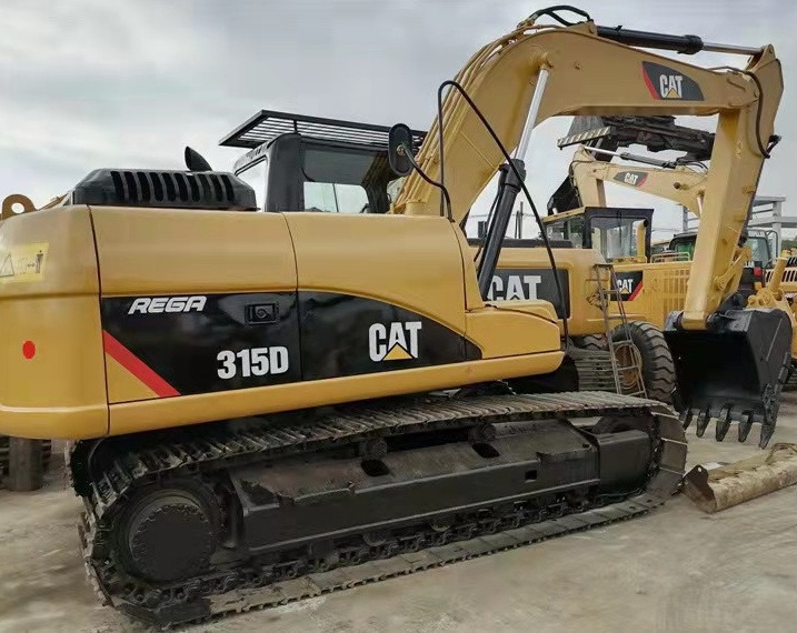 CAT 315D excavator - Lánctalpas kotró: 1 kép. CAT 315D excavator - Lánctalpas kotró: 1 kép.