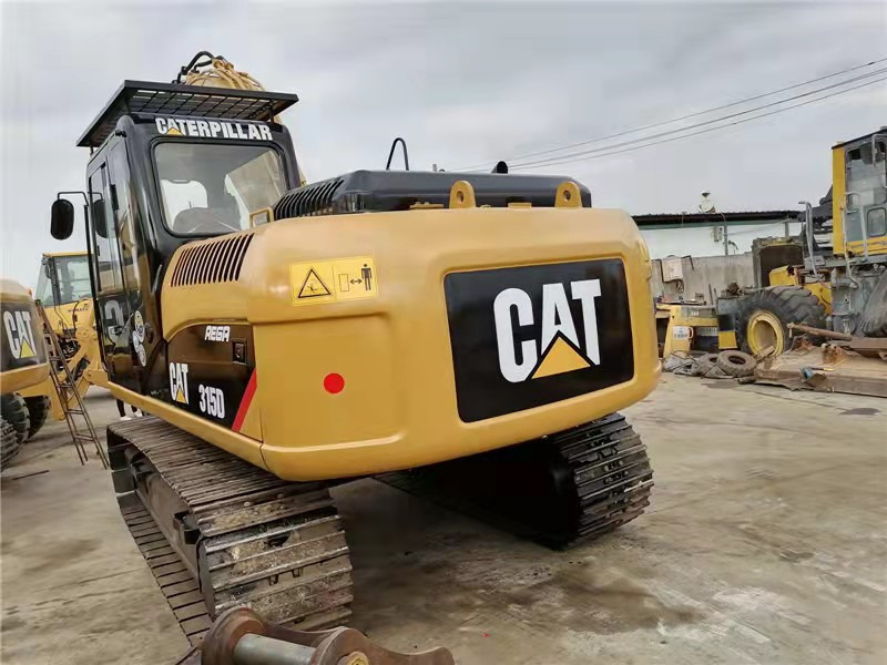 CAT 315D excavator - Lánctalpas kotró: 3 kép. CAT 315D excavator - Lánctalpas kotró: 3 kép.