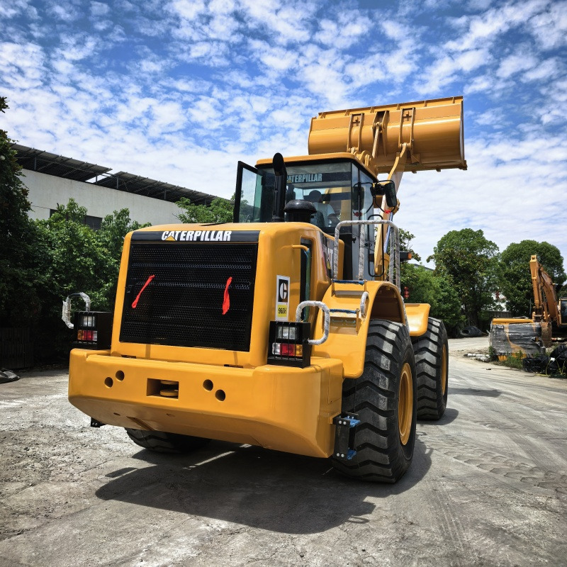CAT 966H wheel loader - Gumikerekes homlokrakodó: 4 kép. CAT 966H wheel loader - Gumikerekes homlokrakodó: 4 kép.
