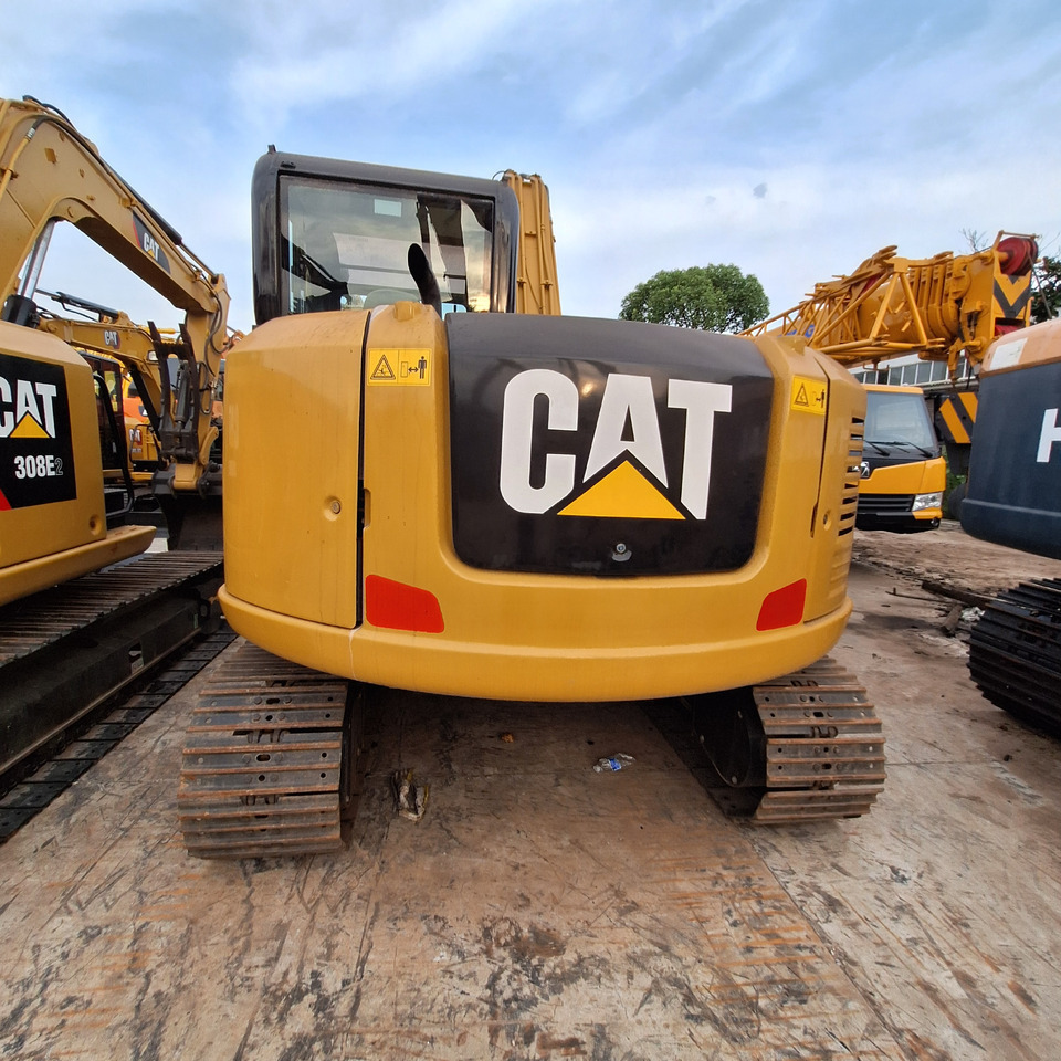 Cat 308e2 Excavator - Lánctalpas kotró: 1 kép. Cat 308e2 Excavator - Lánctalpas kotró: 1 kép.