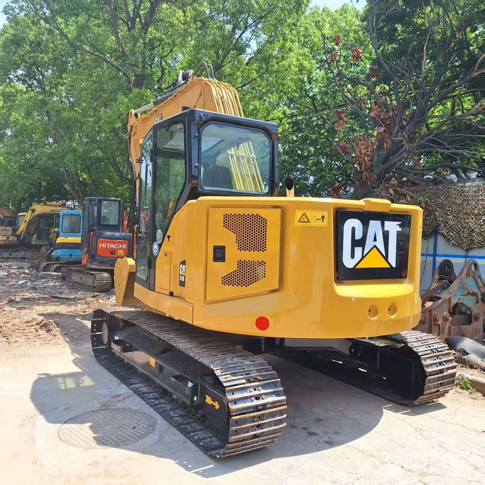 Cat 310 Excavator - Lánctalpas kotró: 5 kép. Cat 310 Excavator - Lánctalpas kotró: 5 kép.